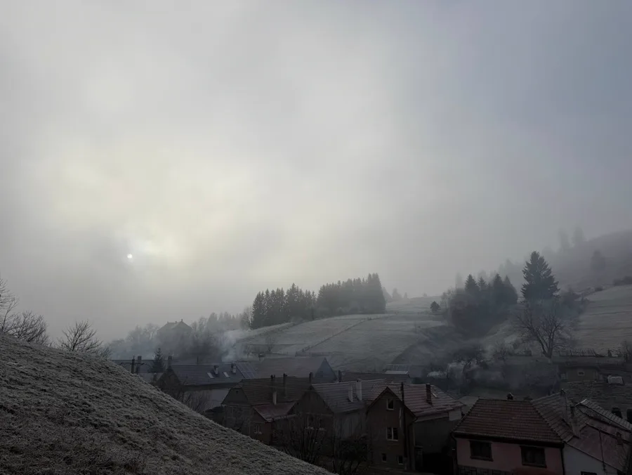 Morning fog and frost over Holbav village